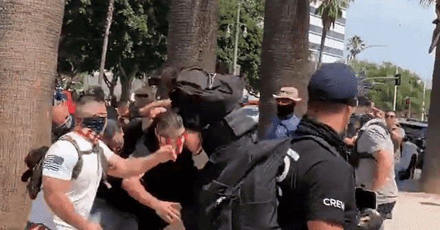 WATCH: Melee Breaks Out in California Between Antifa and
Anti-Vaccine-Mandate Protesters 1