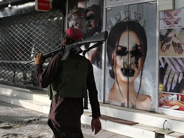 Taliban Spokesman: Women Will Need Chaperones, Music Banned
in Public 1