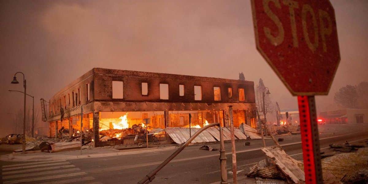 Hundreds of buildings destroyed by the biggest single
wildfire ever recorded in California 1
