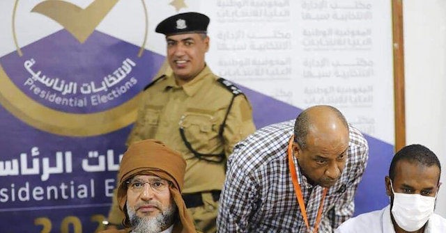 Armed Gunmen Help Ban Qaddafi Son from Libya Presidential
Election 1