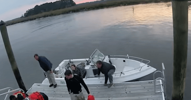 WATCH: Officers in Georgia Brave Frigid Waters to Rescue
Woman Trapped Under Dock 1