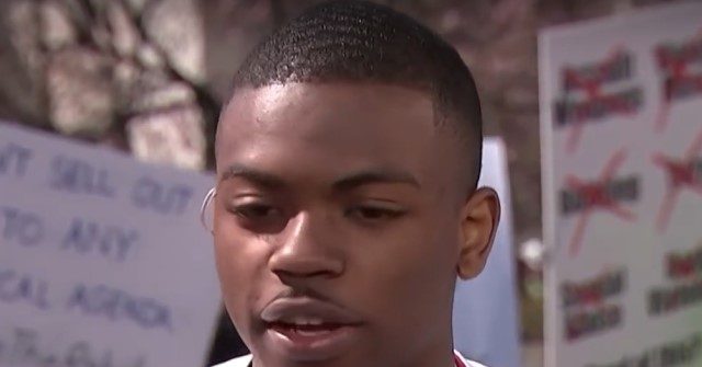 Watch: Attempted Murder Suspect Quintez Brown Told Mitch
McConnell 'We're Gonna Vote You Out' at 2018 Gun Control
March 1