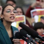 AOC pleads with Biden to cancel more student debt ahead of
the 2022 midterm elections 12